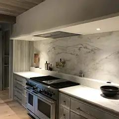 Applicator: Ayn Riggs. Product: Marmorino KS (kitchen hood). Location: Mission Hills, Kansas.